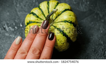 Cozy nails design. autumn leaves. Place for text. cozy autumn fall concept. Trendy manicure.