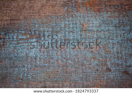 wood texture with old blue paint. grunge background for design