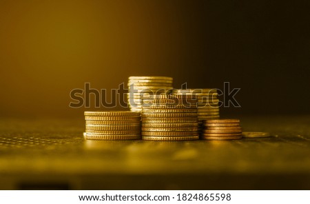 stacks of gold money coin background concept saving money  Royalty-Free Stock Photo #1824865598