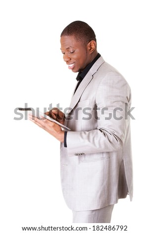 Handsome businessman with tablet computer