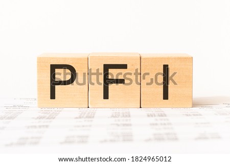 Word pfi. Wooden small cubes with letters isolated on white background with copy space available.Business Concept image.