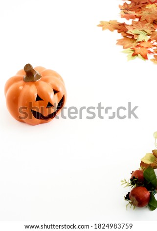 Jack O Lantern  or Pumpkins decor on a white desk at home for happy halloween concept