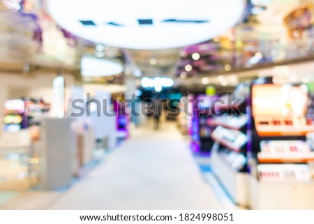 Abstract blur shopping mall and retails of department store interior for background