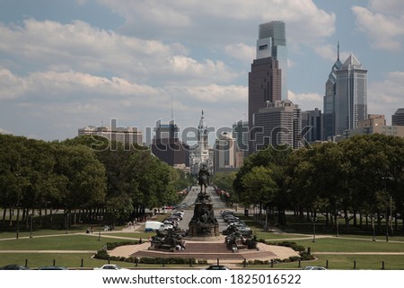 View of Philadelphia City Hall and cityscape with Skyscraper and George Washington Monument during summer in Philadelphia Pennsylvania, USA