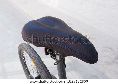 Closeup of a bicycle saddle. Bicycle seat. Royalty-Free Stock Photo #1825122809
