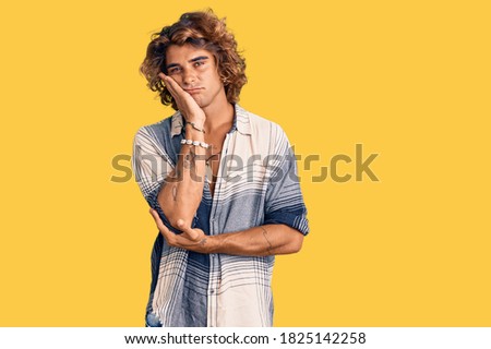 Young hispanic man wearing summer style thinking looking tired and bored with depression problems with crossed arms. 