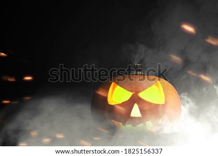 Jack-o-Lantern with smoke and dark background