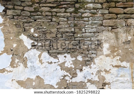 Wall stone grunge texture background. Grungy vintage fortress granite and sandstone. Rough old stone or rock of mountains. Front antique decor castle. Masonry house layout slate.