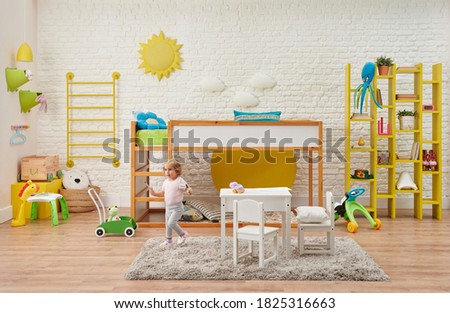 Modern wooden baby room, child, decorative stairs and bunk, table and child style. Toy, white brick wall sun and cloud accessory interior.
