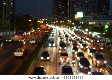 Beautiful background on dark, out of Focus Lights during the Night. Car traffic on Thailand