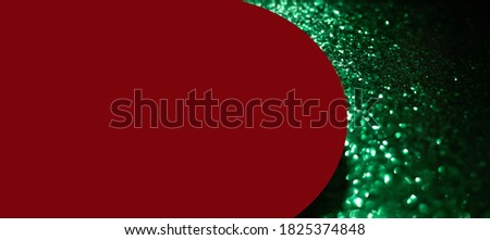 Dark red podium on green glitter trendy festive background. banner with free copy space