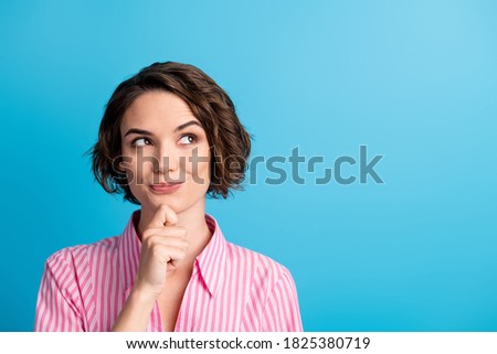 Photo of curly cheerful thoughtful cute lady dressed casual outfit arm finger chin look empty space isolated blue color background Royalty-Free Stock Photo #1825380719