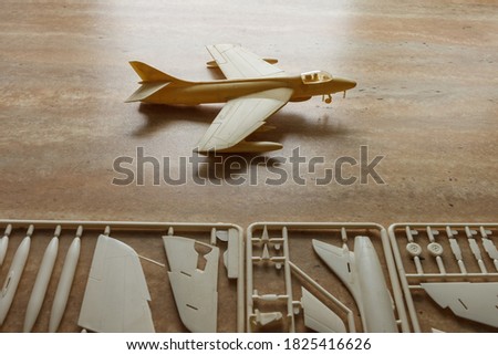 Scale model of the airplane fighter with details. Plastic assembly kit Royalty-Free Stock Photo #1825416626