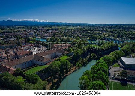 Panoramic aerial view of Lake Garda, the city of Peschiera del Garda. Aerial view at high altitude. Aerial photography with drone. Coast of the largest in Italy Garda lake.