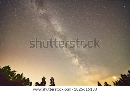 Milky Way, Jupiter and shooting star in the night sky.