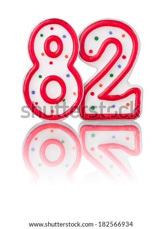 Red number 82 with reflection on a white background