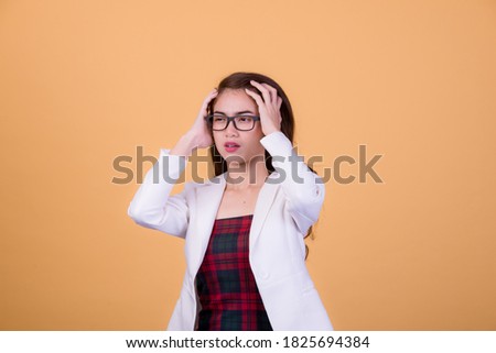 Executive beautiful asia young woman, on yellow color background with copy space. Human face expressions, emotions feelings, body language,beauty and fashion concept.