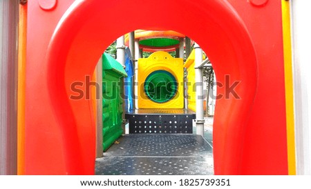 Colorful slides in children's playground                   