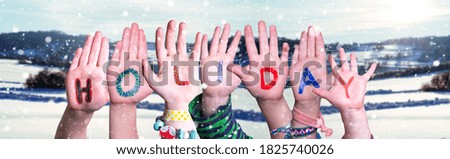 Children Hands Building Word Holiday, Snowy Winter Background