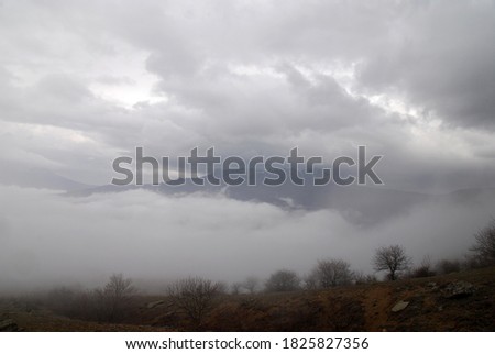 cloudy day in the mountains, clouds and fog