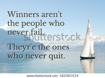 A motivational quote about winning with an ocean as background.
