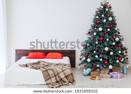 Christmas tree pine Christmas decoration bedroom interior with bed and gifts