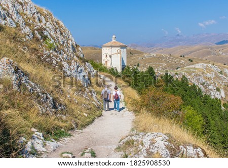 Rocca Calascio, Italy - right beside the wonderful fortress of Rocca Calascio, and located on the top of a mountain, the Santa Maria della Pietà church displays a breathtaking view Royalty-Free Stock Photo #1825908530