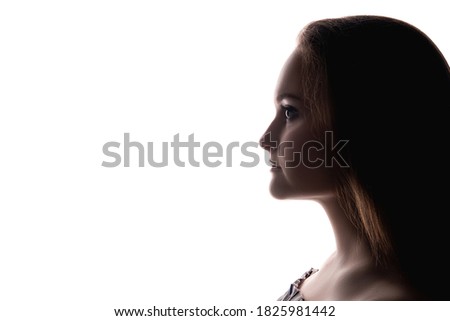 Face contouring. Aesthetic cosmetology. Profile portrait of woman silhouette isolated on white copy space background. Plastic surgery. Skin lifting. Lip augmentation. Cheek reduction.