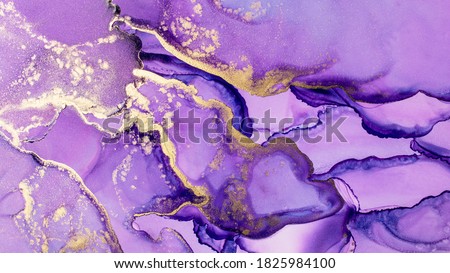 Closeup of purple and shiny golden alcohol ink abstract texture, trendy wallpaper. Art for design project as background for invitation or greeting cards, flyer, poster, presentation, wrapping paper Royalty-Free Stock Photo #1825984100