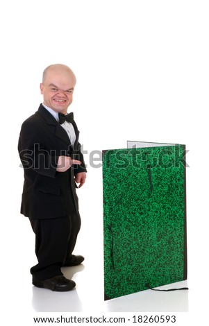 Little man, dwarf waiter in a formal suit with bow tie and over sized menu card, studio shot, white background Royalty-Free Stock Photo #18260593