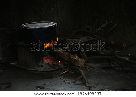 Indian traditional Chulha which operates on coal or dry wood, leaves or organic matter. It creates yellow flame and smoke while burning. The taste of food is enhanced when it is cooked on Chulha