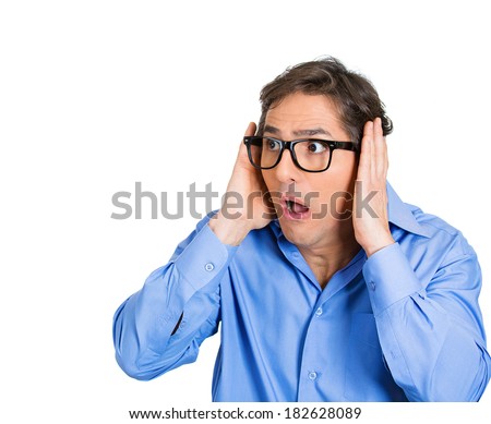 Closeup portrait young nerdy man with glasses looking to side scared, confused, disoriented, lost, anxious, afraid to be followed isolated white background. Negative facial expression emotion reaction
