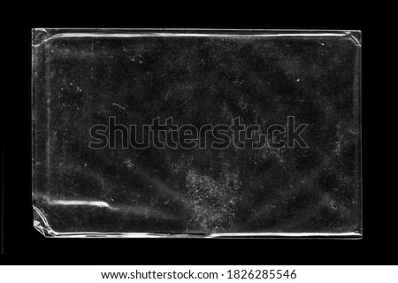 Blank transparent wrinkle plastic packaging overlay with grungy texture Royalty-Free Stock Photo #1826285546