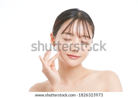 Beauty portrait of young Asian woman on white background Royalty-Free Stock Photo #1826323973