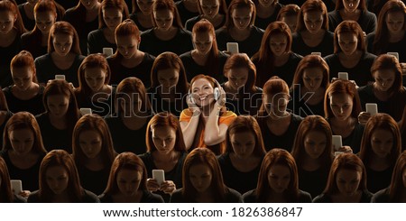 Top view of grey crowd of identical people and special one woman, difference and diversity concept. Unique among the faceless, not like everyone else. Listening to music, looks happy. Collage. Royalty-Free Stock Photo #1826386847
