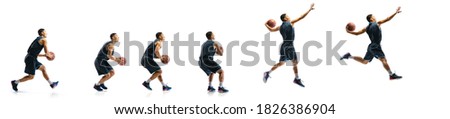 Attacking. Young basketball player of team training in action, motion in jump of step-to-step goal isolated on white background. Concept of sport, movement, energy and dynamic, healthy lifestyle.
