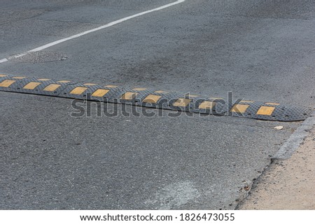 Traffic safety. Artificial roughness on the road. Stock photo.