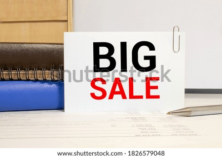 Financial concept meaning Big Sale with sign on the sheet
