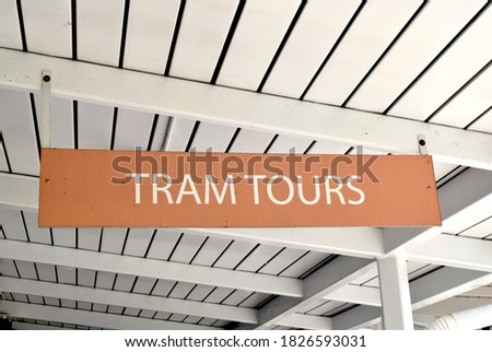 Tram Tours in a Park - Sign