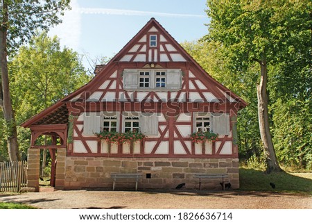 beautiful landscape with half timbered house in germany Royalty-Free Stock Photo #1826636714