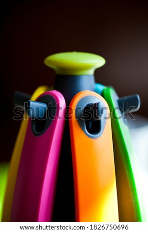 Plastic kitchenware hanger close-up photo