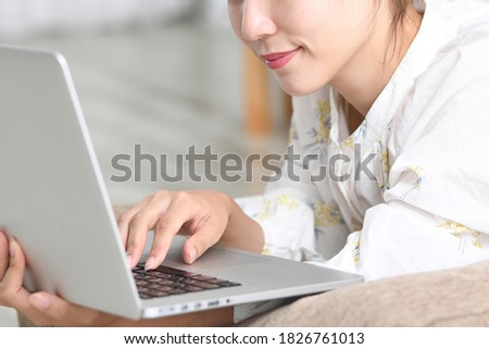 beautiful asian woman using laptop computer