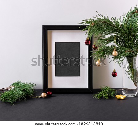 Christmas modern composition with copy space for text. Mock up poster in the Christmas interior. Frame Interior Scandinavian Christmas Winter Decoration