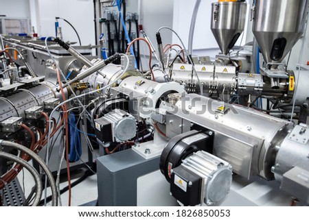 Extruder machine for extrusion of plastic material, close-up view Royalty-Free Stock Photo #1826850053