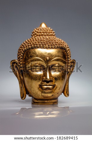 gilded Buddha head