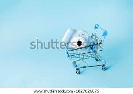 Photo camera store shopping cart suitable for e-commerce website graphic