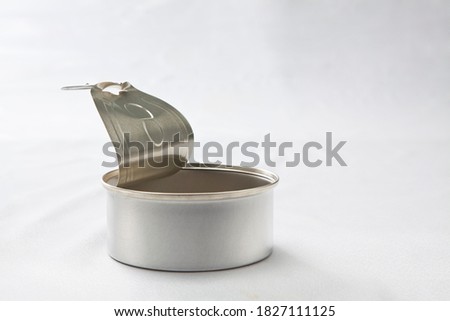 Tin cans with open lid Royalty-Free Stock Photo #1827111125