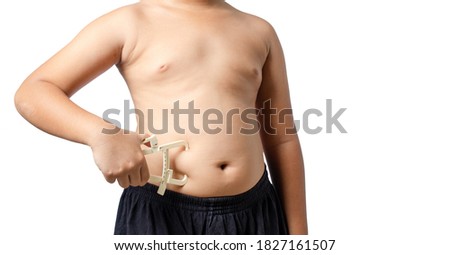 Fat boy with measuring caliper isolated on white background.healthy concept.