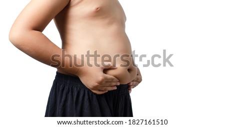 Boy hands touching her fat on body isolated on white background.healthy concept.