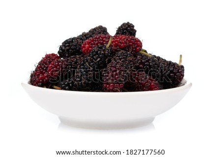 Bowl of Mulberry isolated on white background
